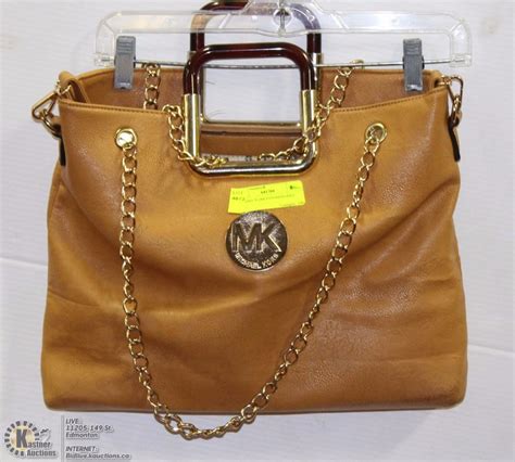 michael kors portemonnaie fake|michael kors purse logo.